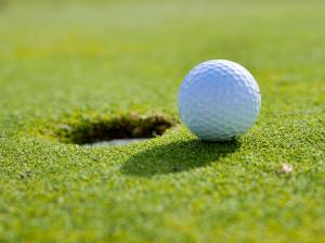golf ball near hole