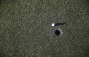 Golf ball near hole